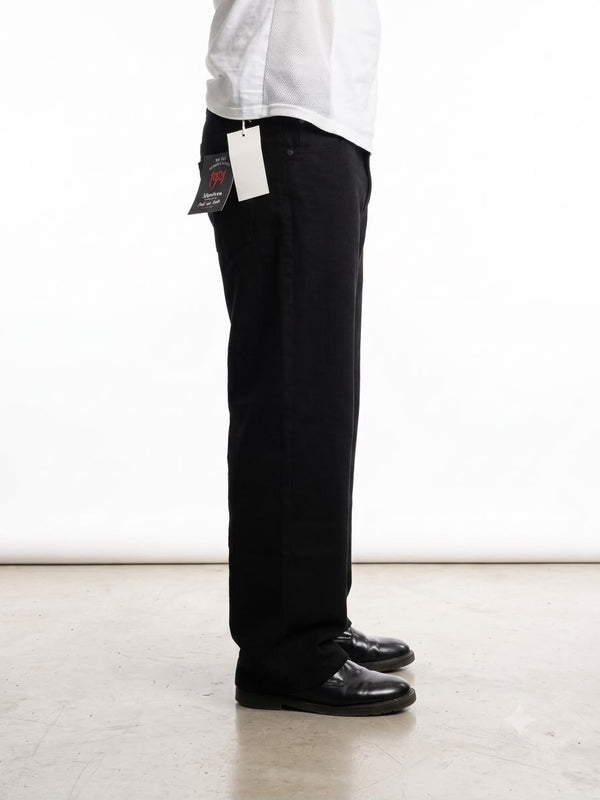 Men's vintage wash baggy denim jeans with a loose fit.