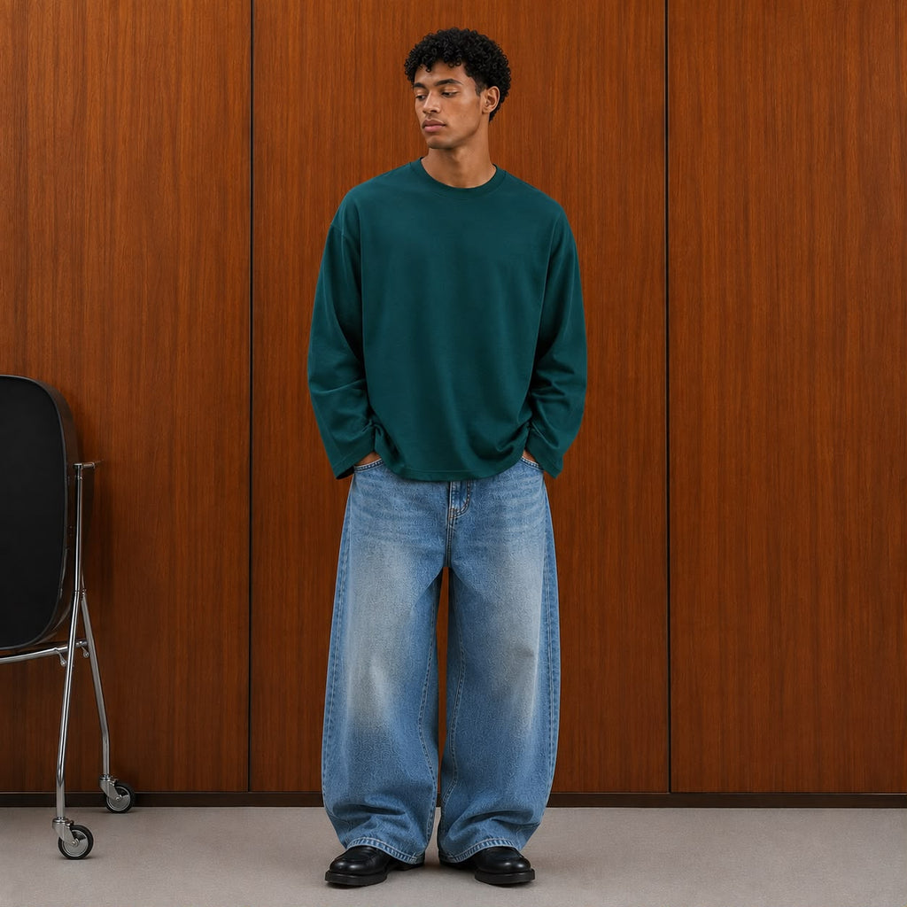 oversized long sleeve T-shirt with textured fabric, styled with light gray cargo pants.