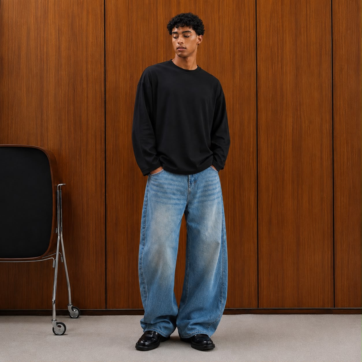oversized long sleeve T-shirt with textured fabric, styled with light gray cargo pants. Main image