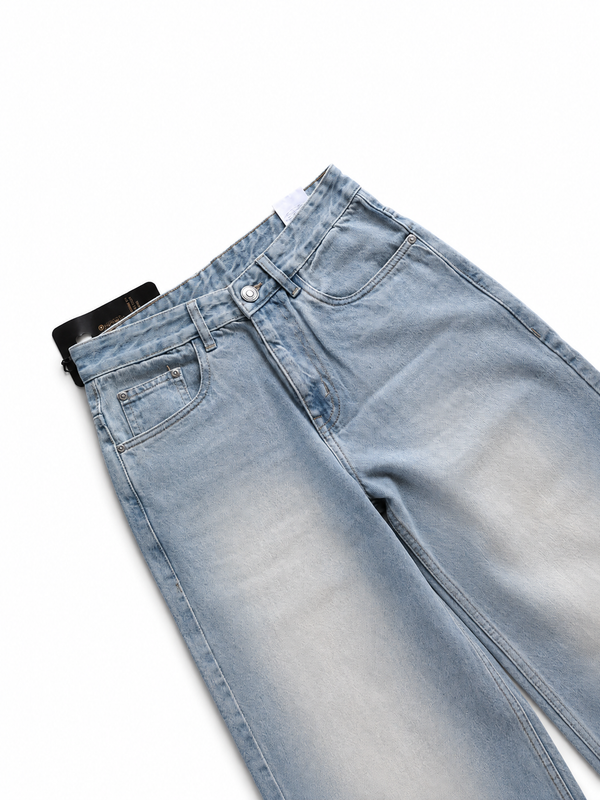 Men's light blue wide leg denim jeans with a relaxed fit
