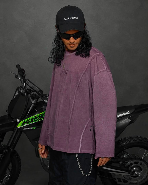 Model wearing a washed mauve oversized full sleeve t-shirt