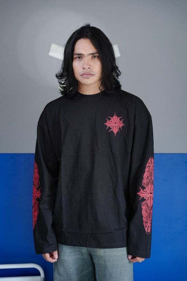 Men's black oversized graphic full sleeve T-shirt with chest and sleeve print.