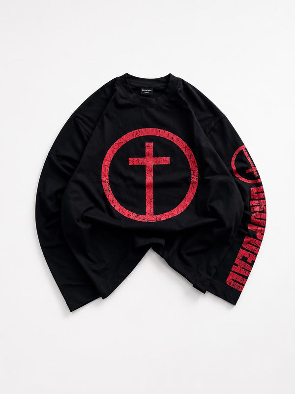 White oversized long sleeve graphic T-shirt featuring a distressed red cross circle front print and bold red sleeve graphic, laid flat on a white background for streetwear fashion.