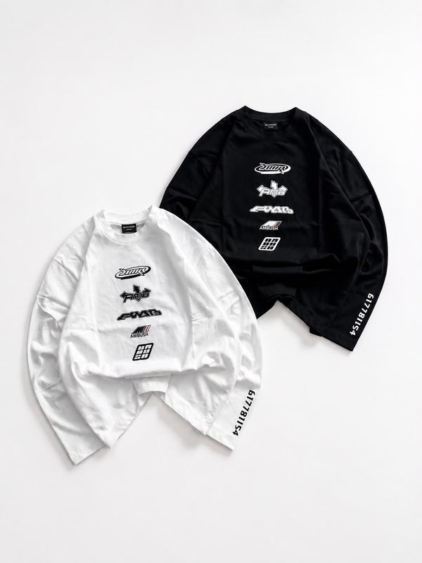 White oversized long sleeve graphic T-shirt featuring a distressed red cross circle front print and bold red sleeve graphic, laid flat on a white background for streetwear fashion.