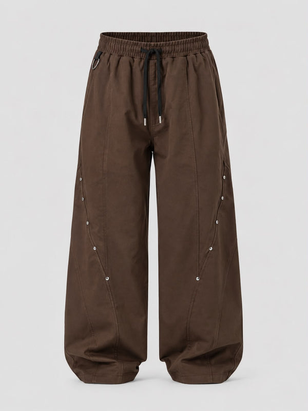 Mocha brown utility wide-leg cargo pants with elastic drawstring waist, relaxed fit