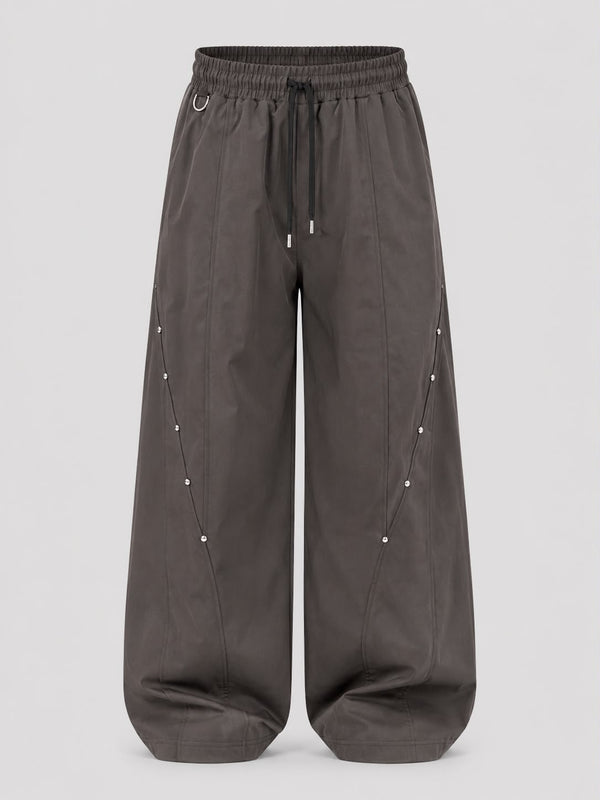 Mocha brown utility wide-leg cargo pants with elastic drawstring waist, relaxed fit
