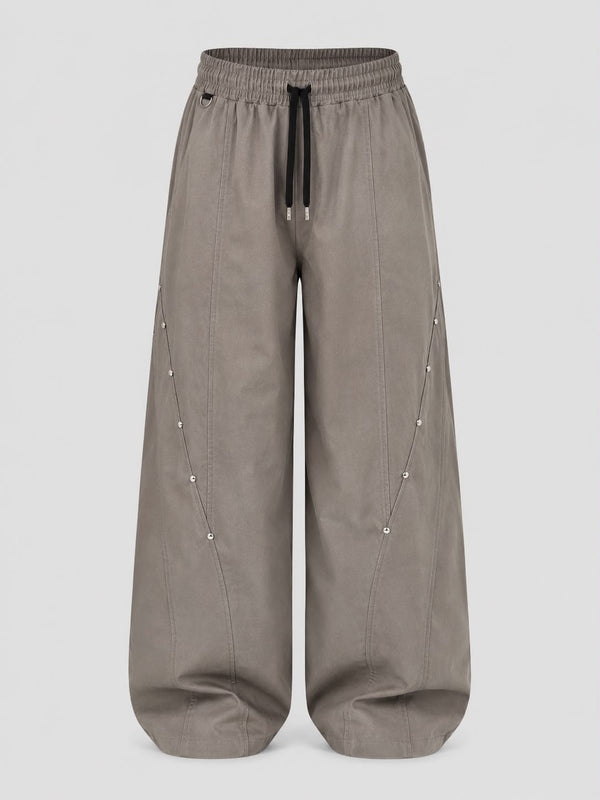 Mocha brown utility wide-leg cargo pants with elastic drawstring waist, relaxed fit