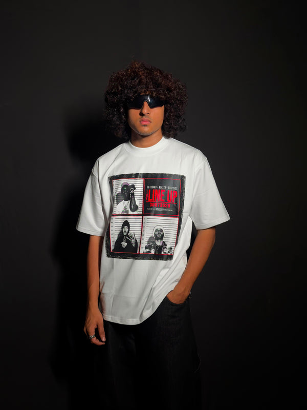 Model wearing a white oversized graphic T-shirt