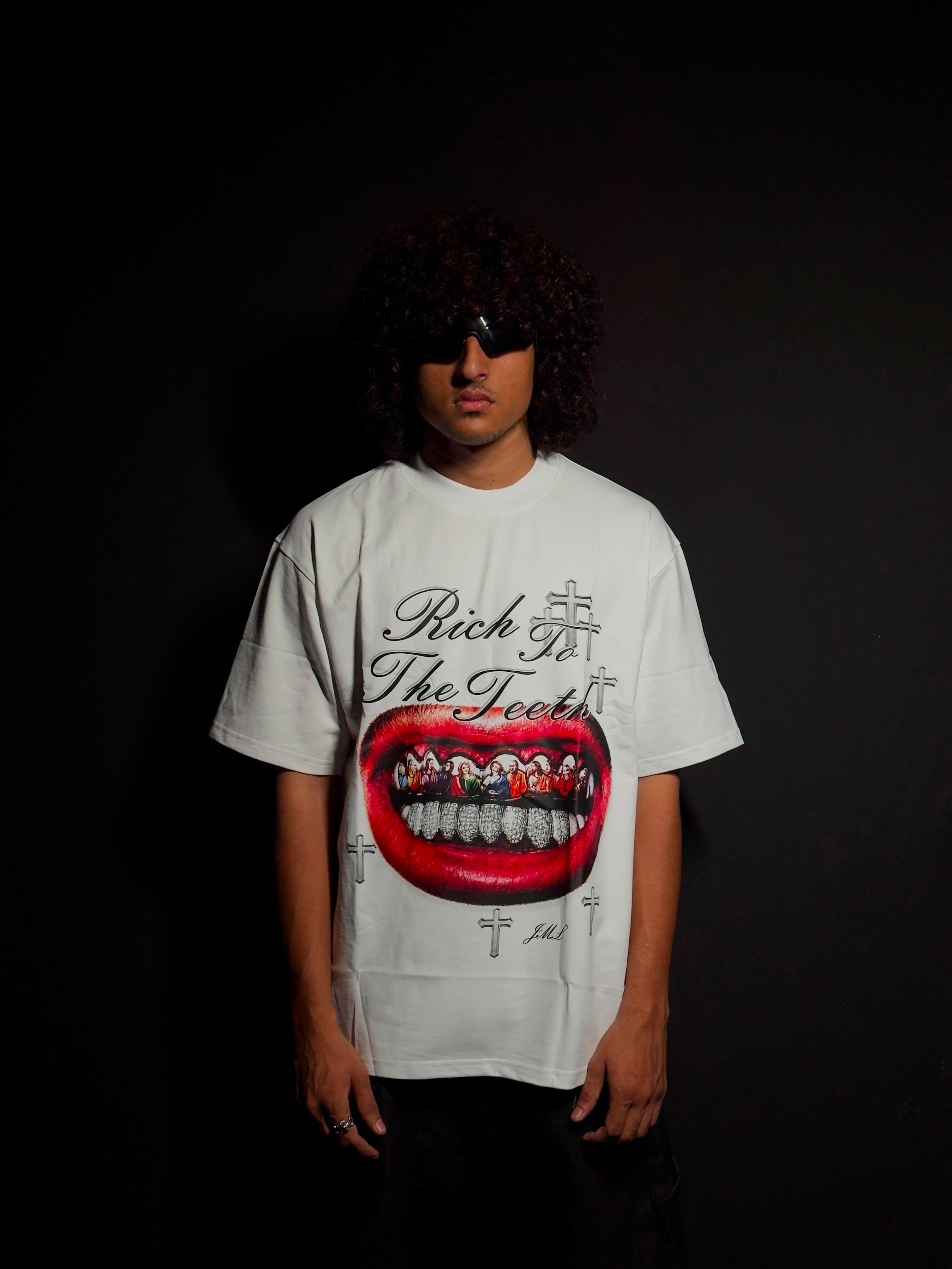 Model wearing a white oversized graphic T-shirt