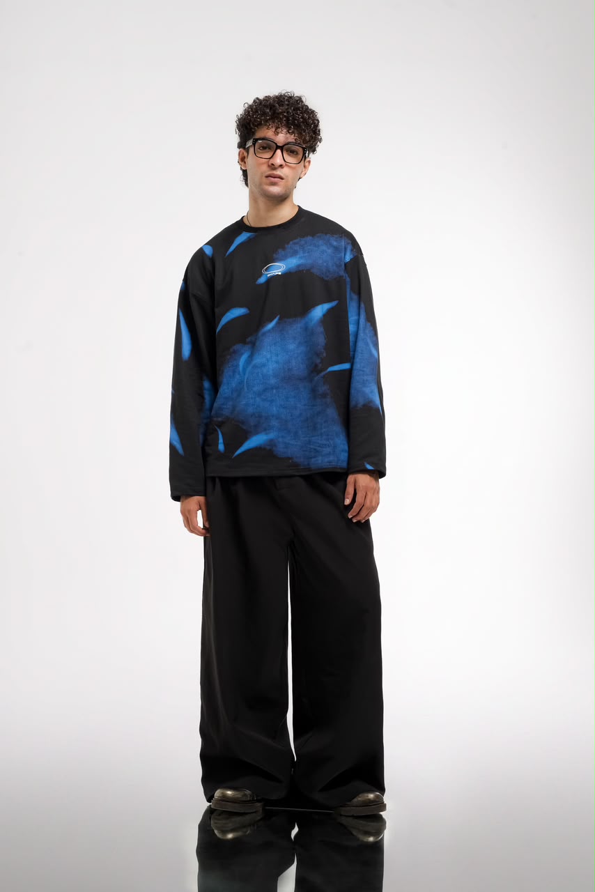 Men’s black and green abstract graphic full-sleeve T-shirt with relaxed streetwear fit.