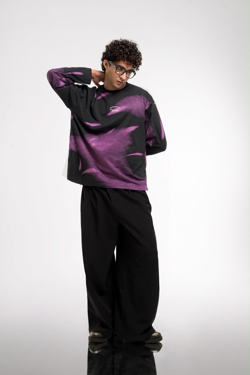 Men’s black and green abstract graphic full-sleeve T-shirt with relaxed streetwear fit.