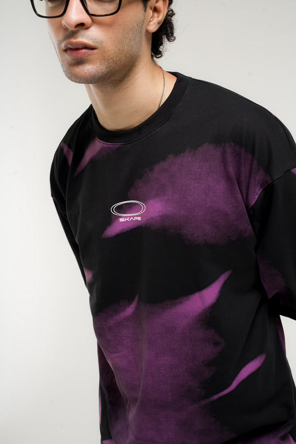 Men’s black and green abstract graphic full-sleeve T-shirt with relaxed streetwear fit.