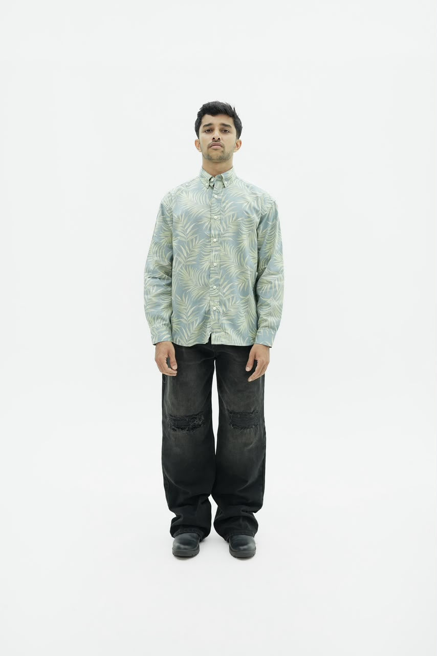 Men’s sage green botanical leaf print full-sleeve shirt with button-down front.