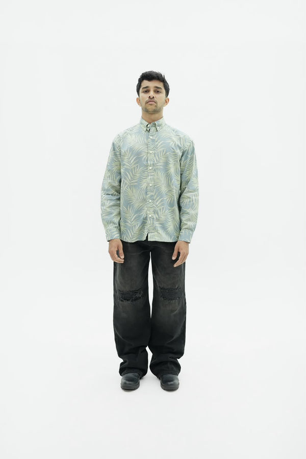 Men’s sage green botanical leaf print full-sleeve shirt with button-down front.
