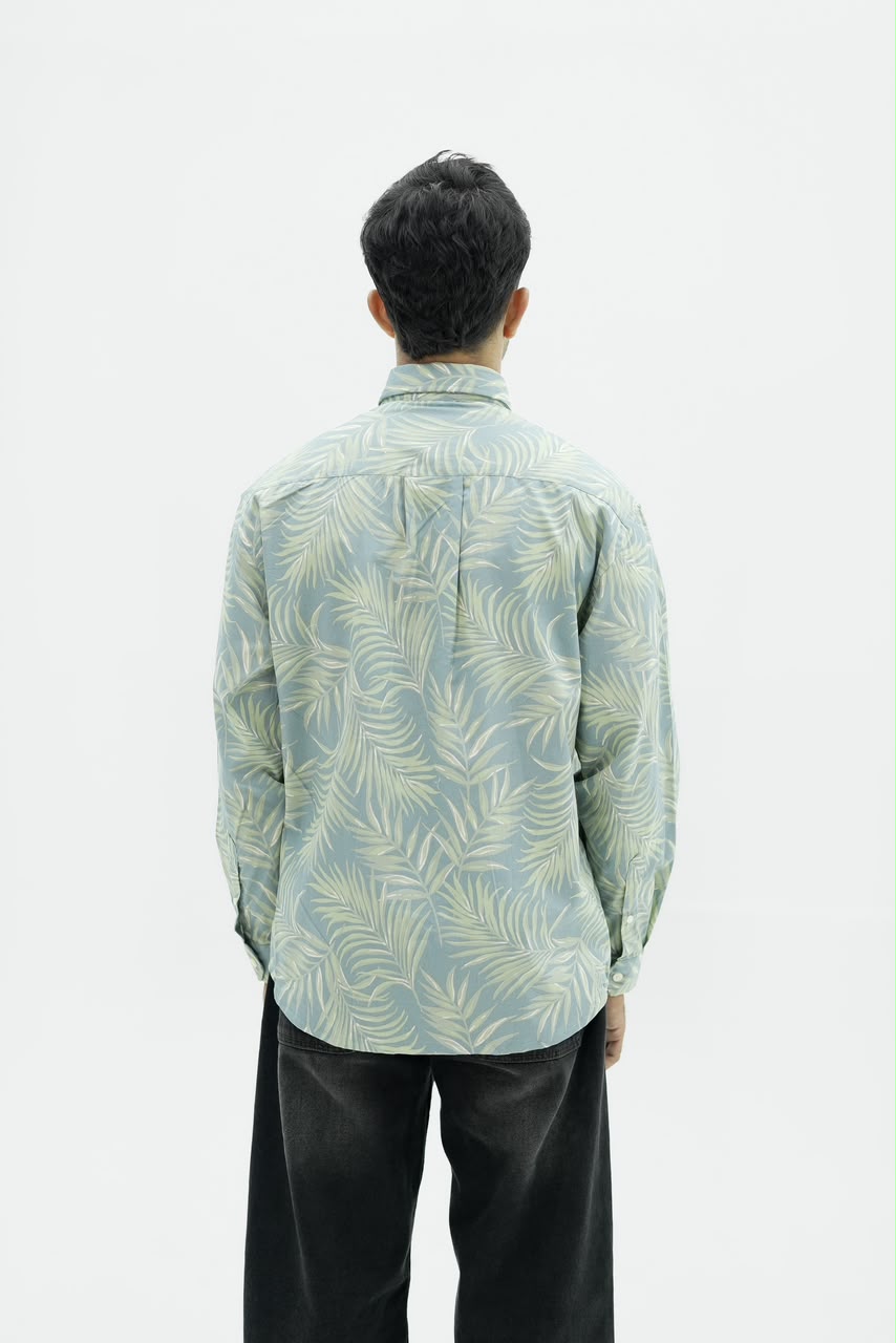 Men’s sage green botanical leaf print full-sleeve shirt with button-down front.