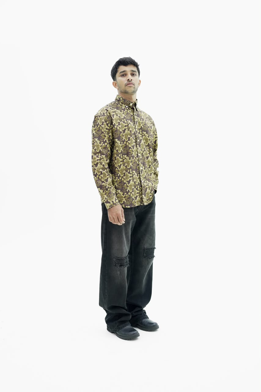 Men’s sage green botanical leaf print full-sleeve shirt with button-down front.