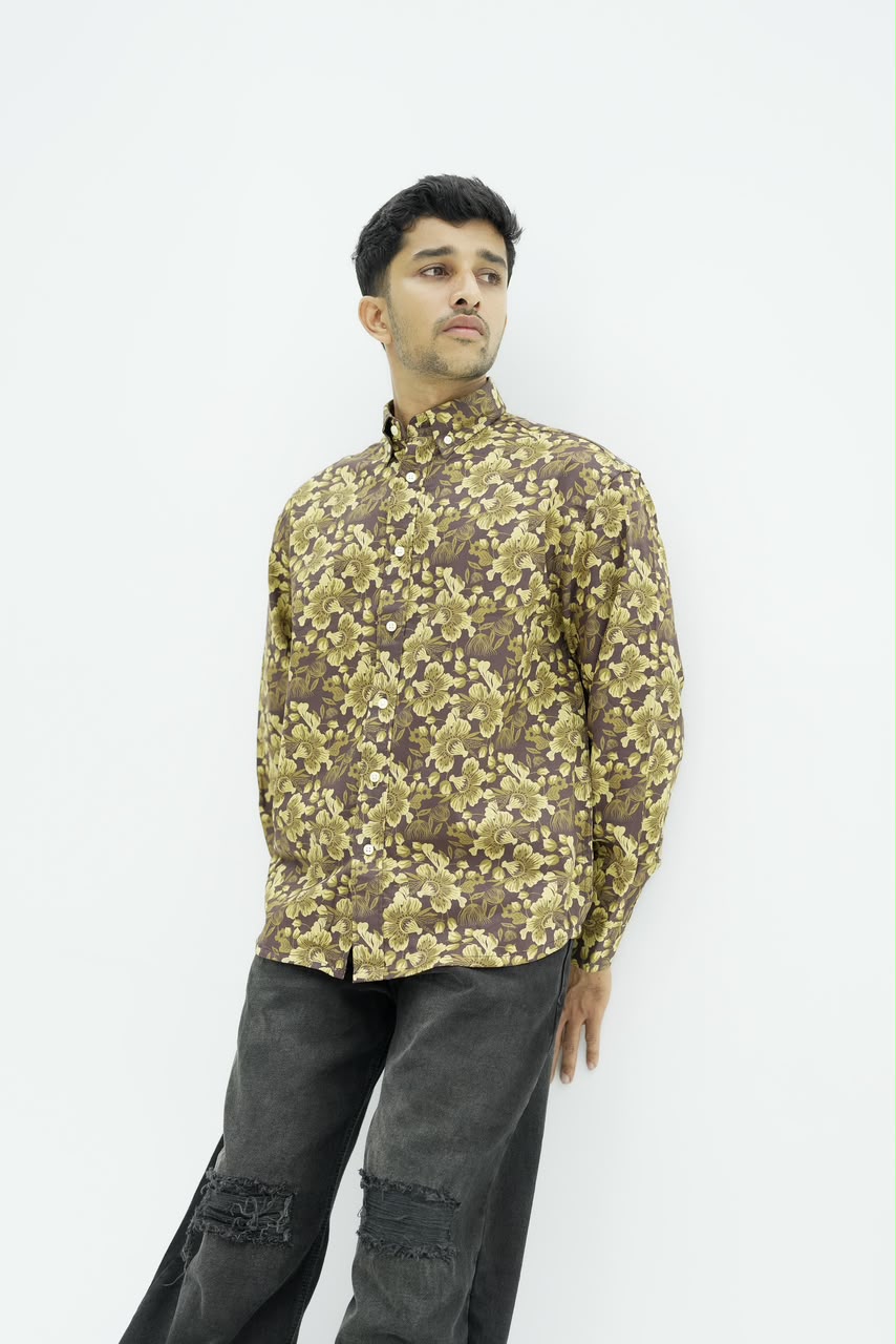 Men’s sage green botanical leaf print full-sleeve shirt with button-down front.