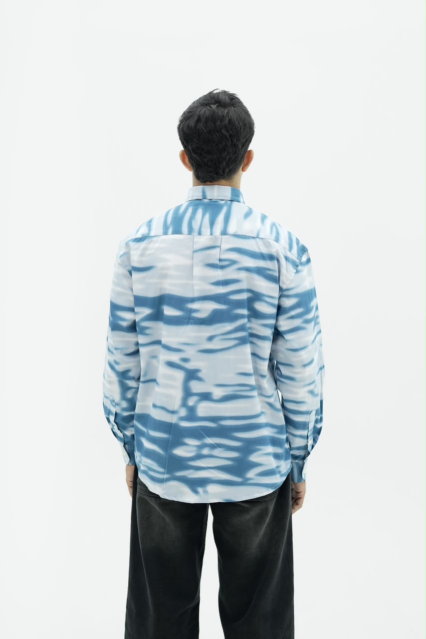 Men’s sage green botanical leaf print full-sleeve shirt with button-down front.